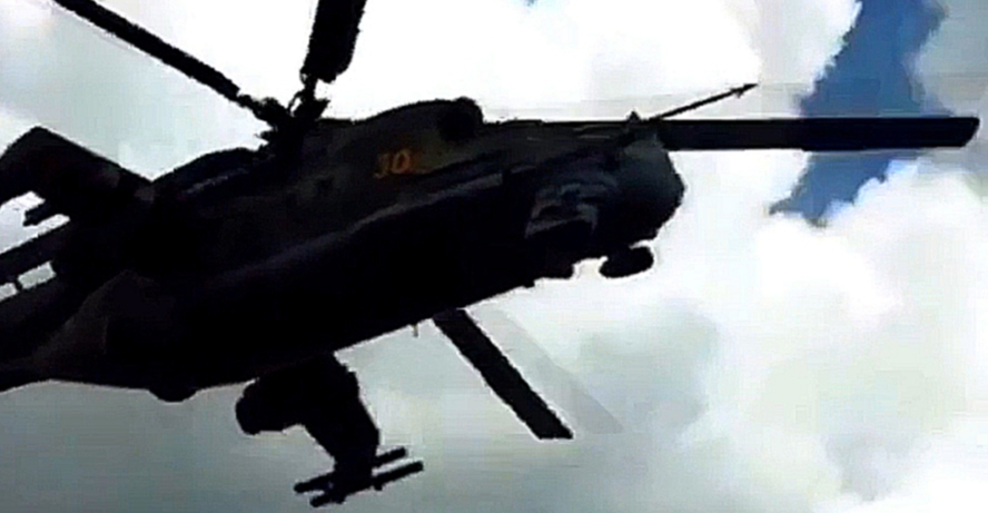 Видеоклип Ми-24 ВКС РФ патрулирует окрестности авиабазы 