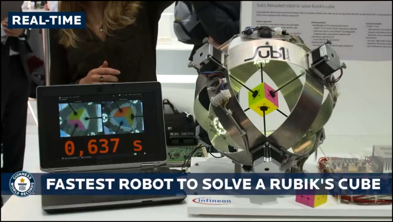 Робот собирает кубик Рубика меньше, чем за 1 секунду